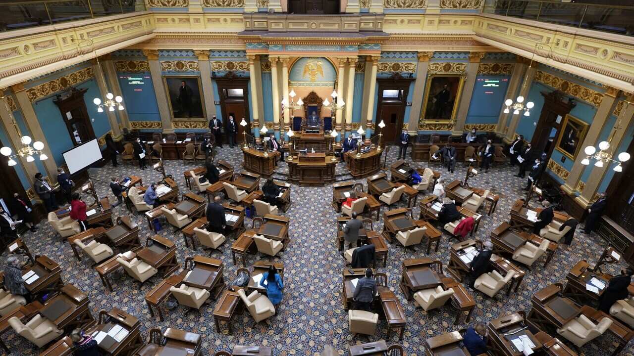 Michigan Lt. Gov. Garlin Gilchrist opens the state's Electoral College session at the state Capitol, Monday, Dec. 14, 2020 in Lansing, Mich. (AP Photo/Carlos Osorio, Pool)