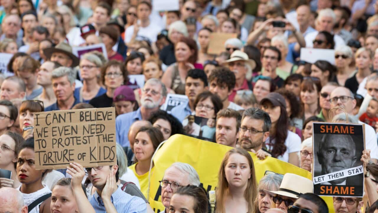 Thousands of people gather at the Sydney Stands for Sanctuary rally