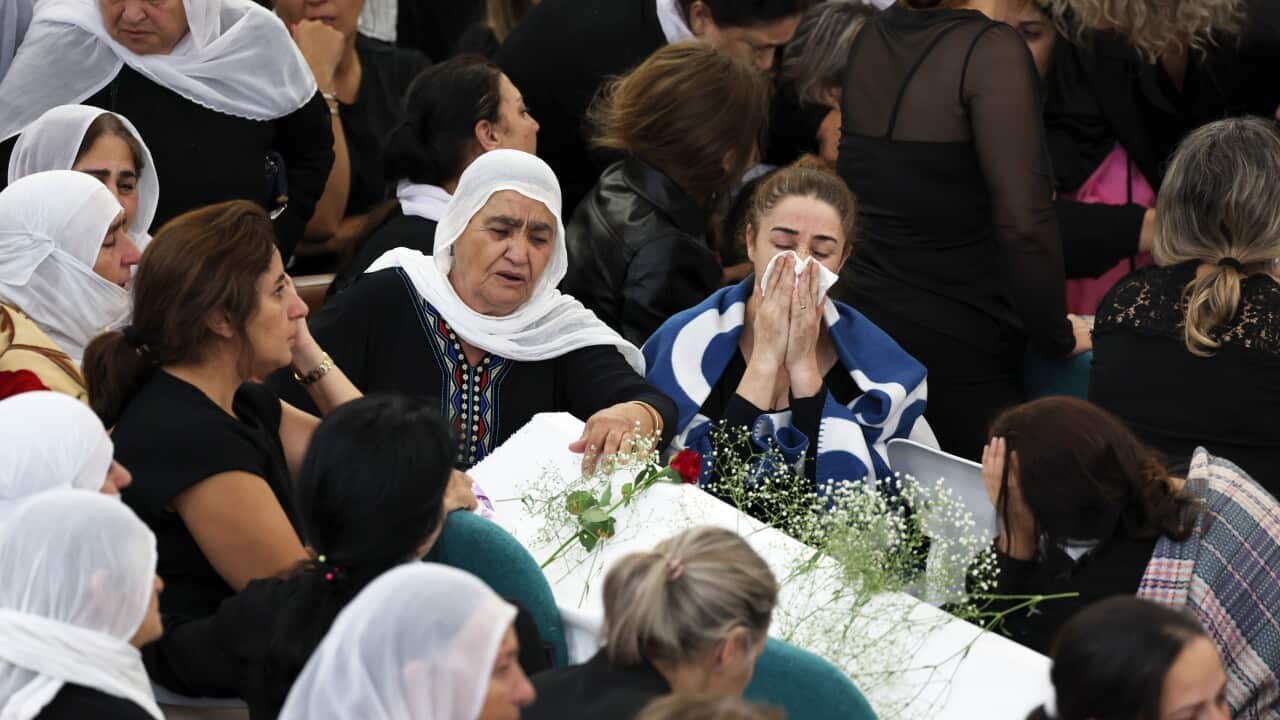 People at a funeral.