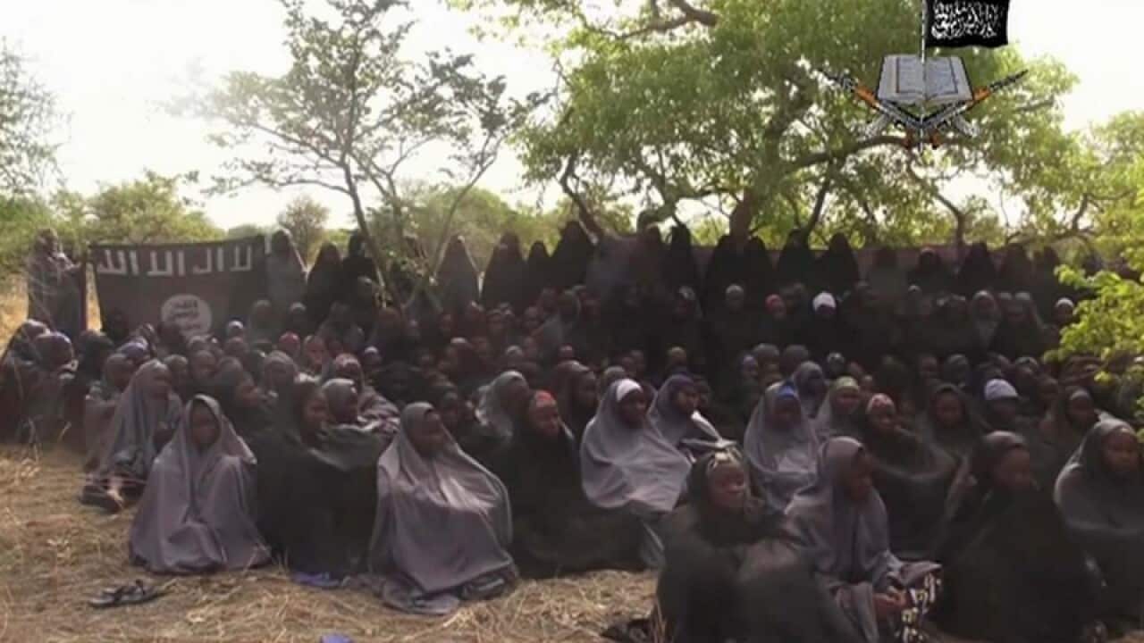 File photo taken from video released by Nigeria's Boko Haram network in 2014 shows girls abducted from the town of Chibok