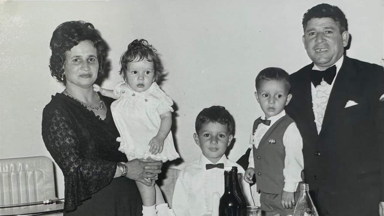 Josie Gagliano as a child with her parents and her brothers.