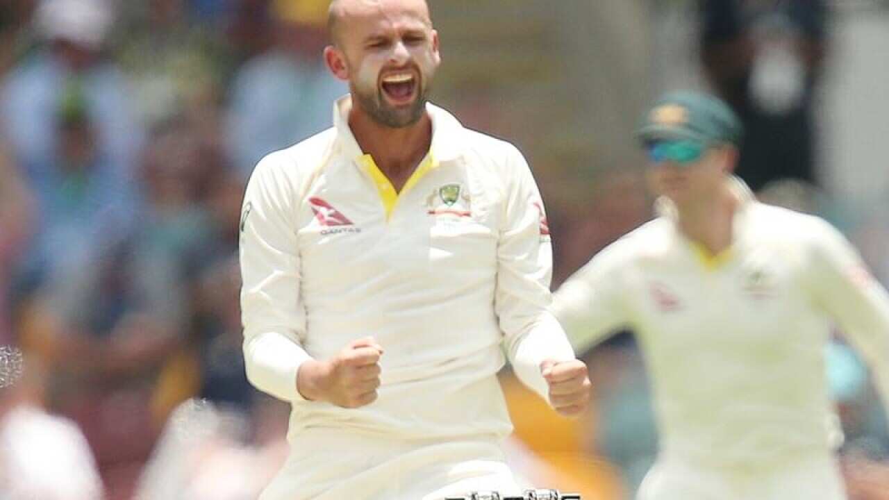 Australian bowler Nathan Lyon celebrates taking a wicket