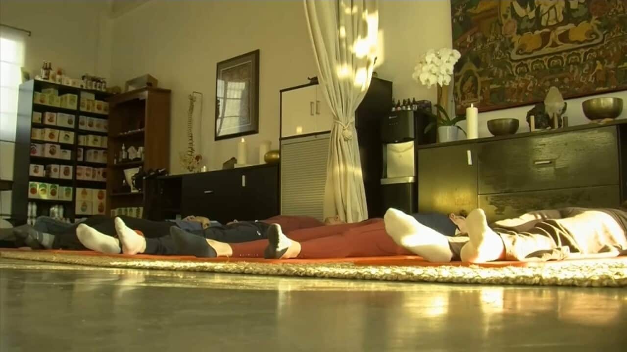 Experiencing a sound bath (AP).jpg