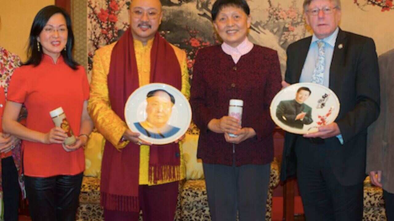 Gladys Liu left and Bruce Atkinson right, with WTUF Founder Baima Aose and China's United Front co-ordinator Zhang Meiying in Beijing January 2015.