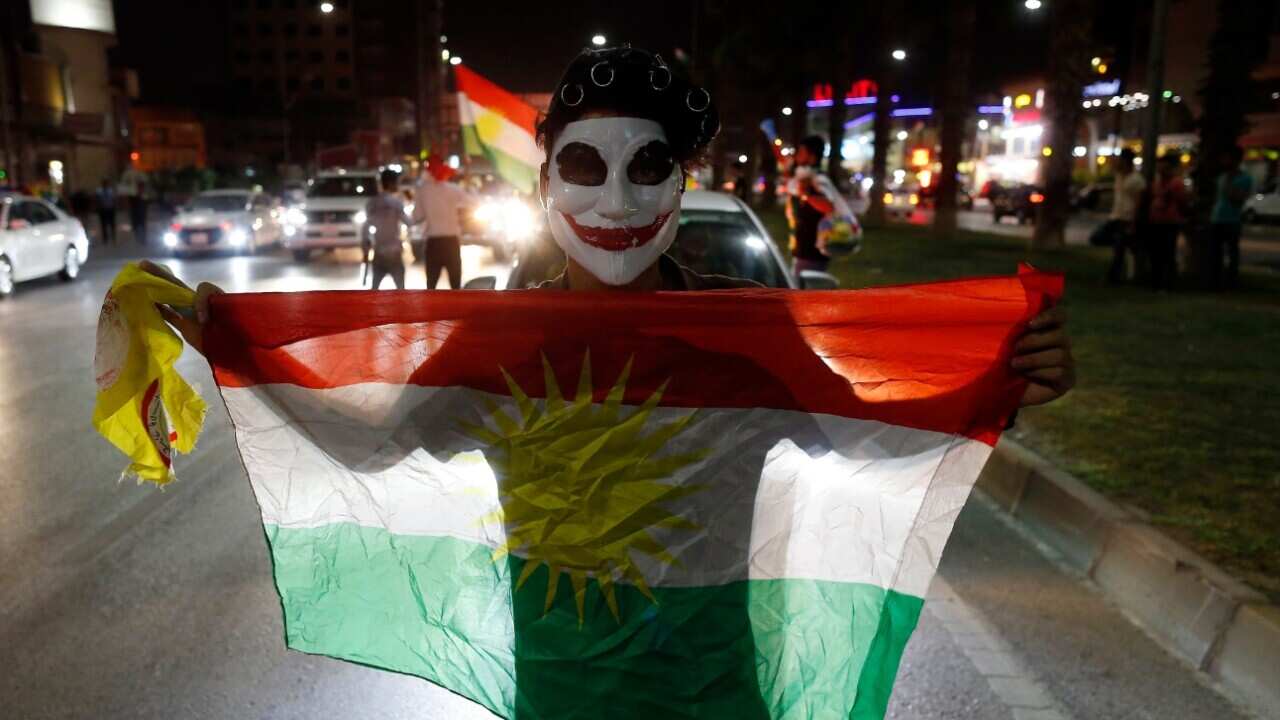 Kurds celebrate after the announcement of the results of the independence referendum in Erbil, Kurdistan region in northern Iraq, 26 September 2017.