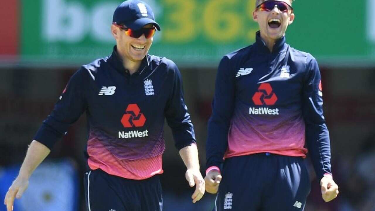 England captain Eoin Morgan (left) and Joe Root celebrate