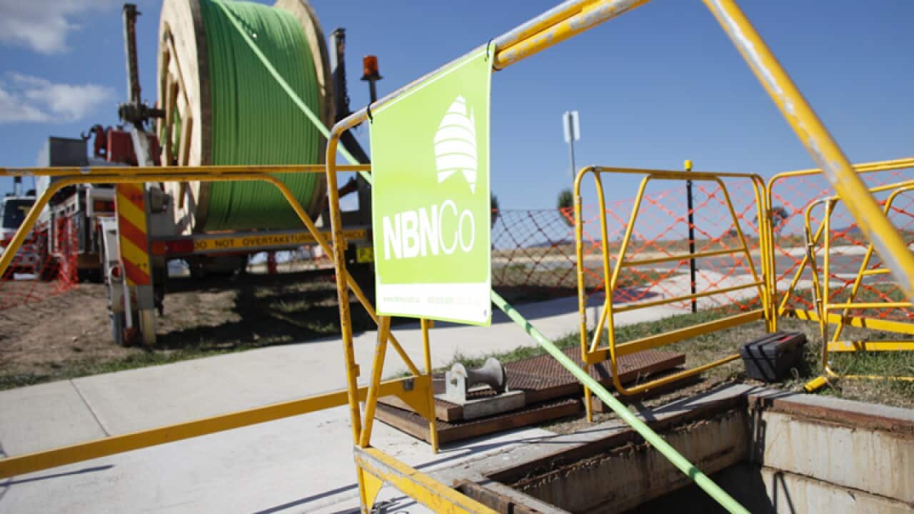 A fibre optic cable is rolled out in Canberra