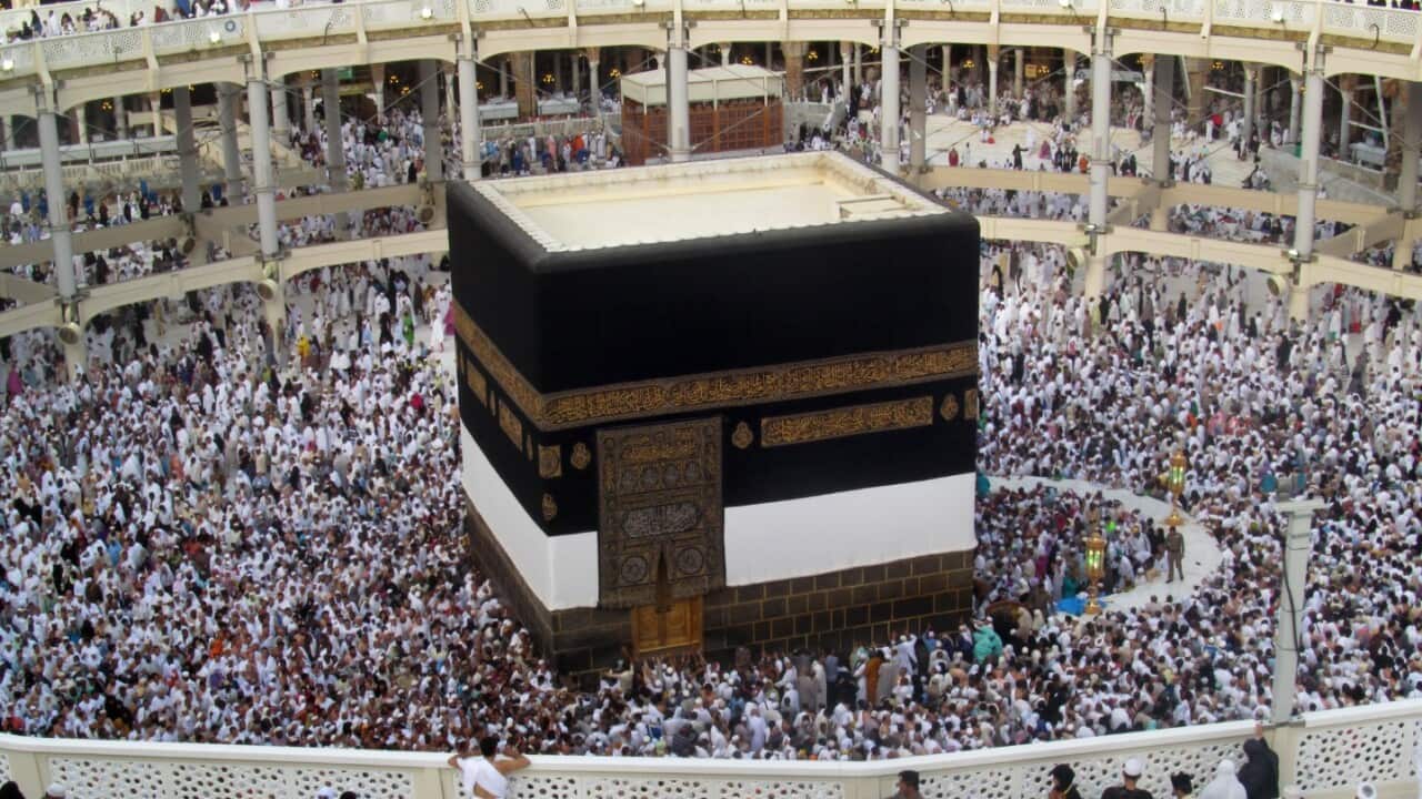 Muslim pilgrims circle the Kaaba, the cubic building situated in the central part of the Grand Mosque in the Muslim holy city of Mecca, Saudi Arabia