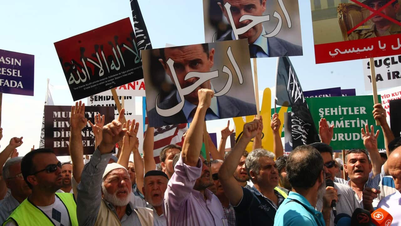 assad_protests_getty.jpg
