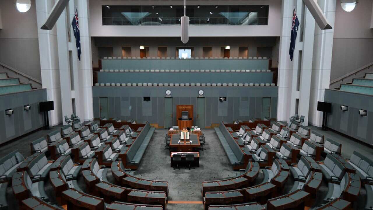 The empty chamber of the House of representatives is seen at Parliament House in Canberra, Monday, November 27, 2017. (AAP Image/Lukas Coch) NO ARCHIVING
