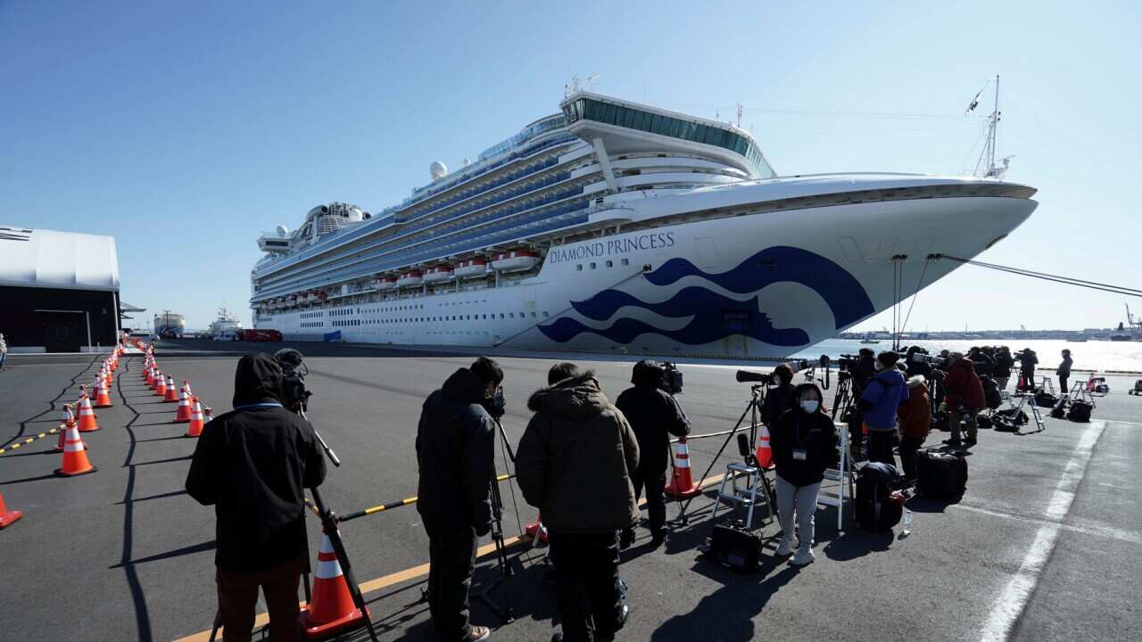 Diamond Princess sits in quarantine in the Yokohama Port Sunday, Feb. 9, 2020, Yokohama, Japan