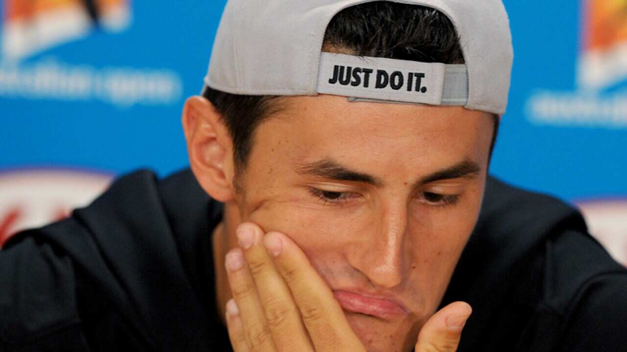 Bernard Tomic at a press conference
