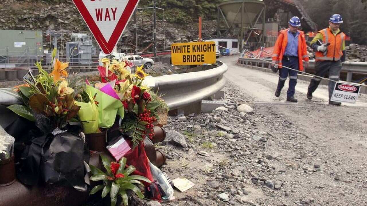 A bouquet of flowers for victims of the mine explosion lie on the road