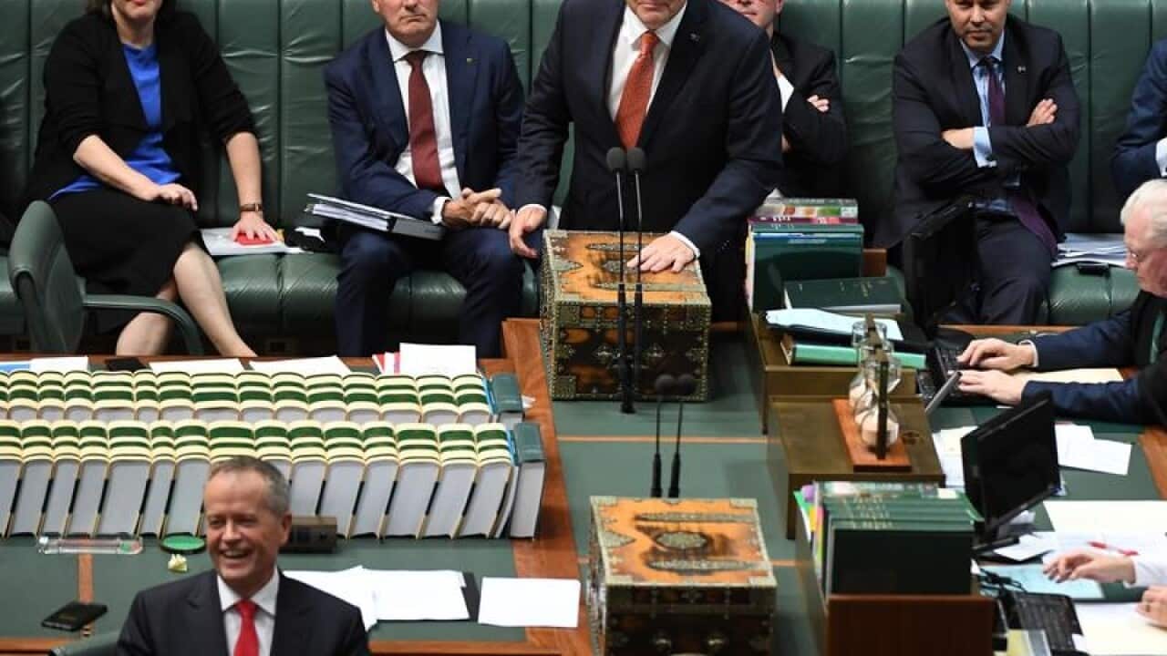 Scott Morrison (top) and Bill Shorten (below) in Parliament