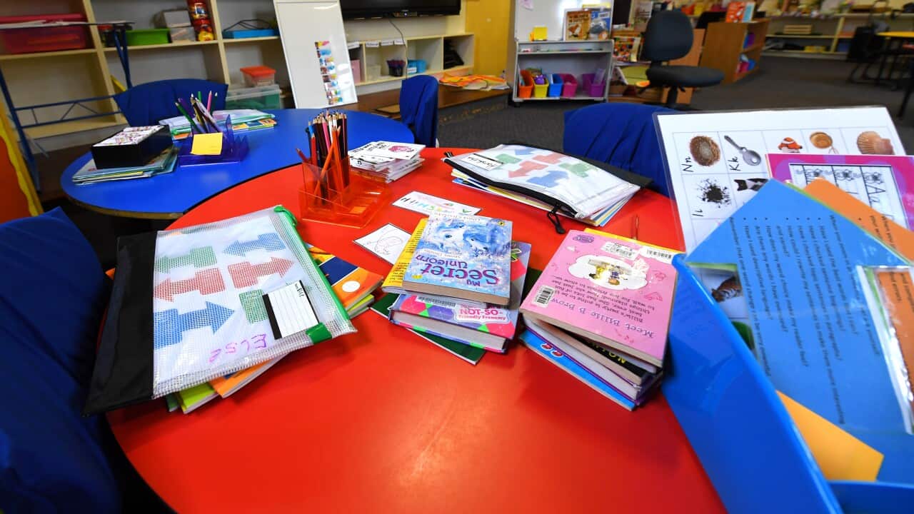 Students books and resources are seen in a class room in Melbourne.
