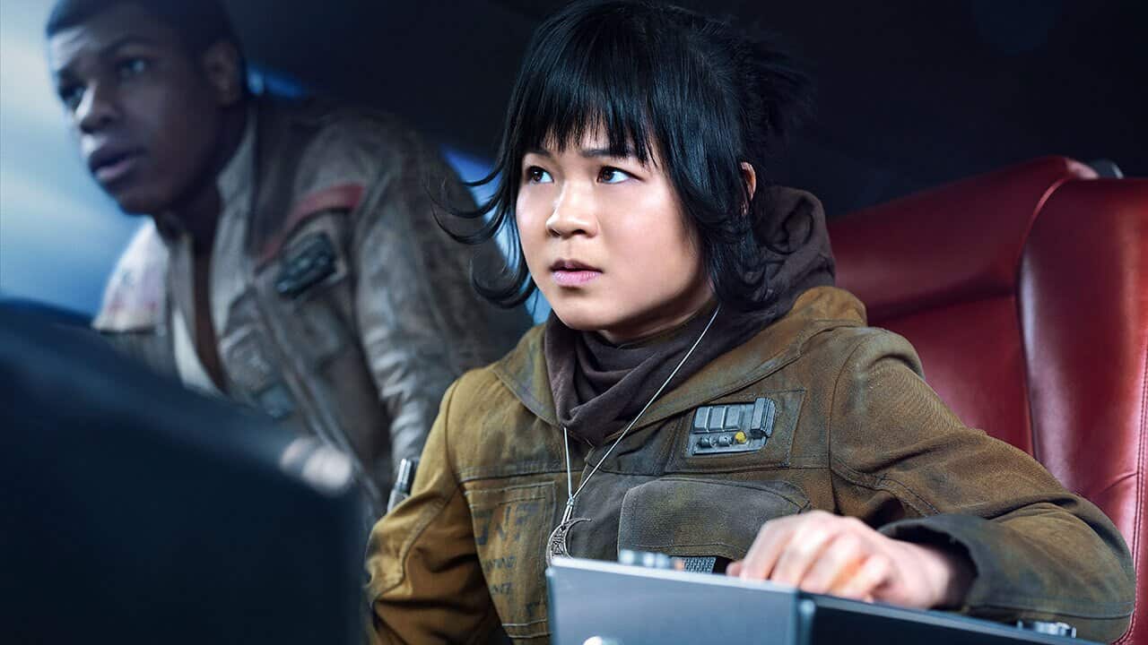 Kelly Marie Tran as Rose and John Boyega as Finn,