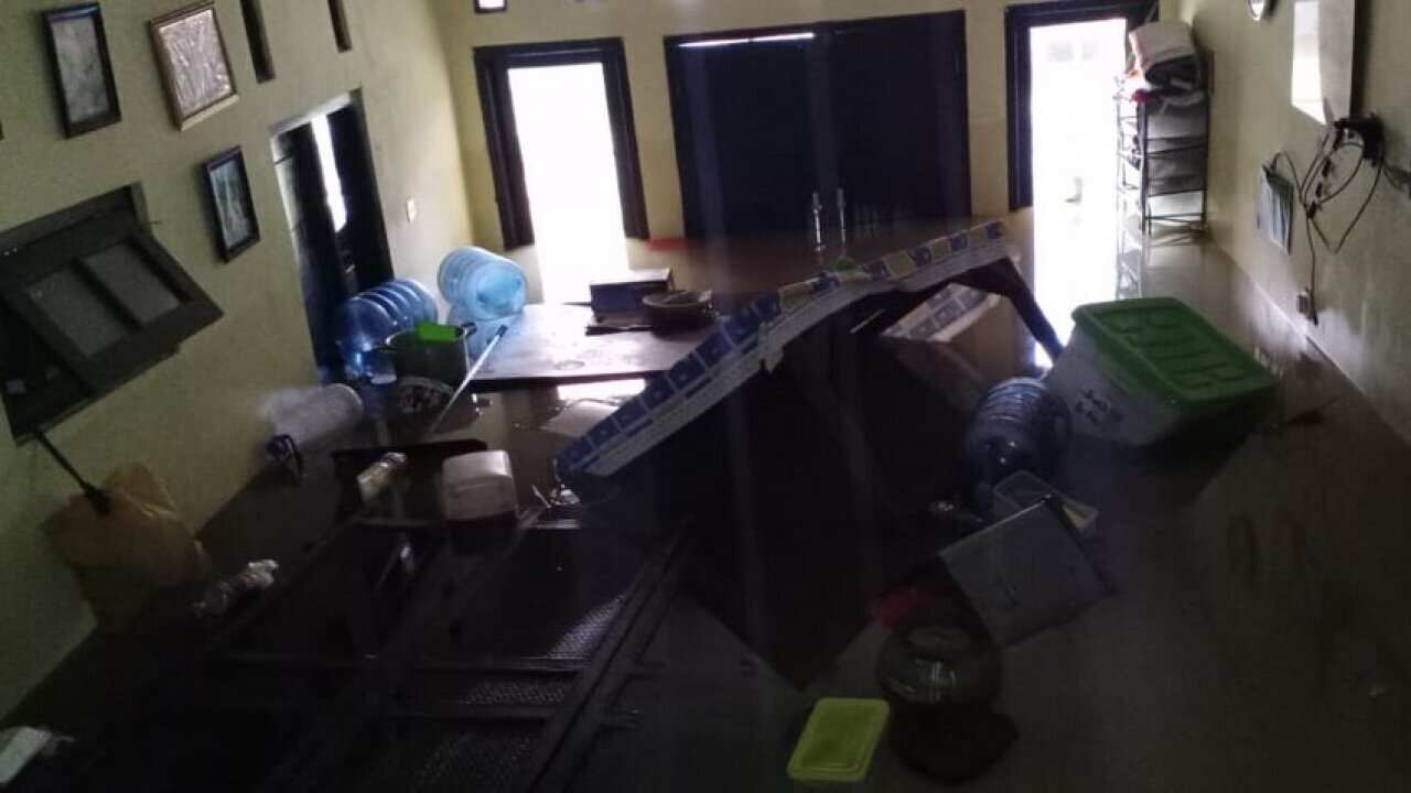 After flooding stopped people start doing the clean up, 8 Jan 2020.