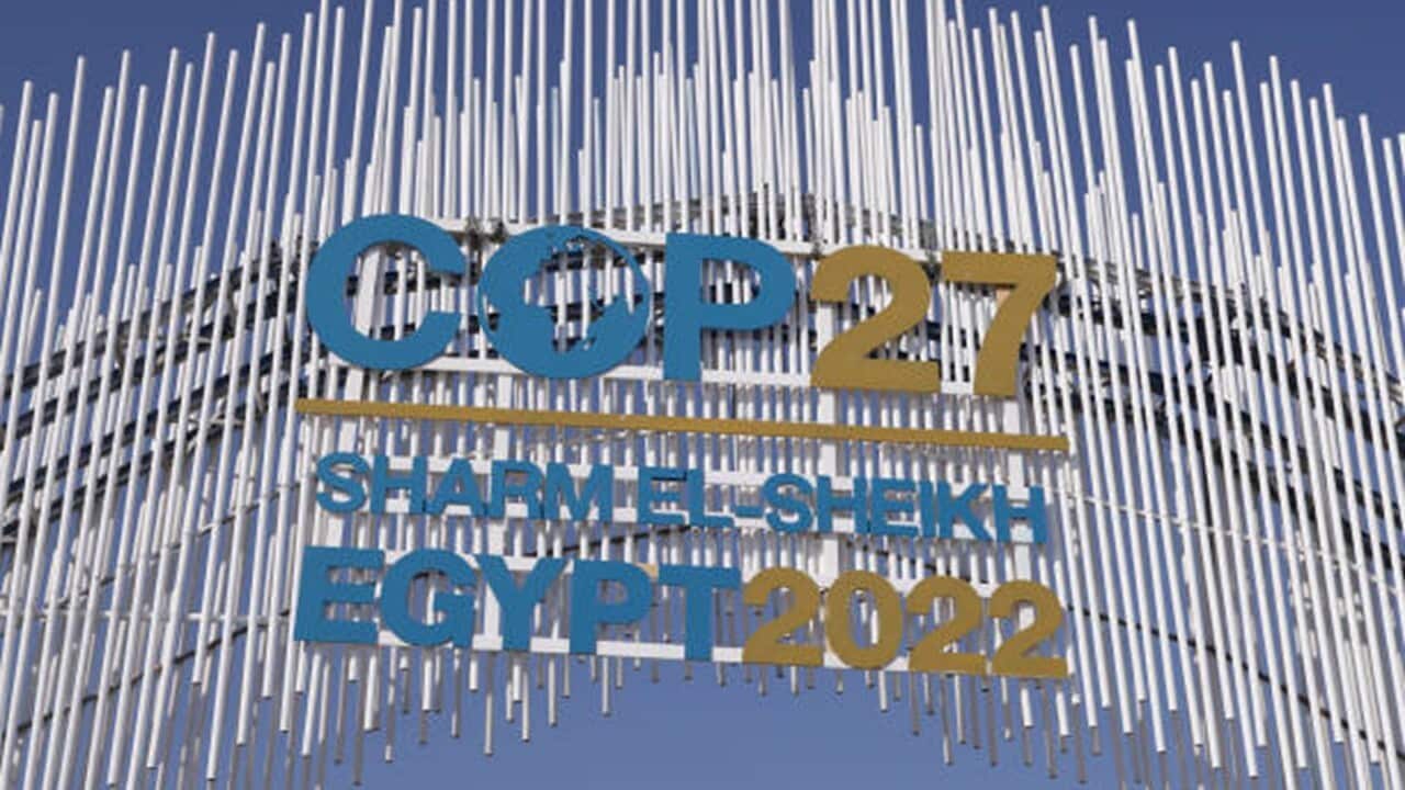 A sign hangs over the main entrance on day two of the UNFCCC COP27 climate conference on November 07, 2022 in Sharm El Sheikh, Egypt.jpg