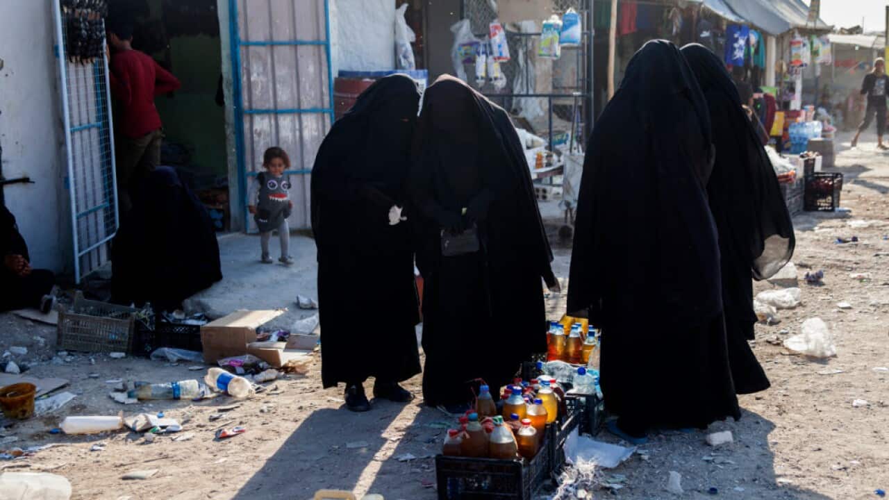 Image obtained Saturday, October 5, 2019 of women in the Al Hawl camp, Syria