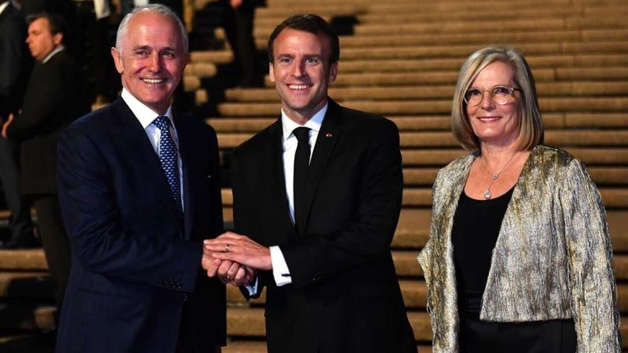 Emmanuel Macron with Malcolm and Lucy Turnbull.