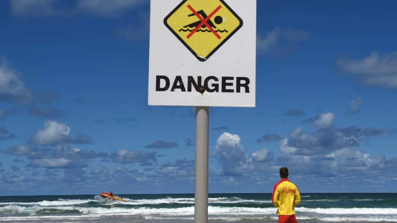 A surf rescue boat off the coast of a NSW beach