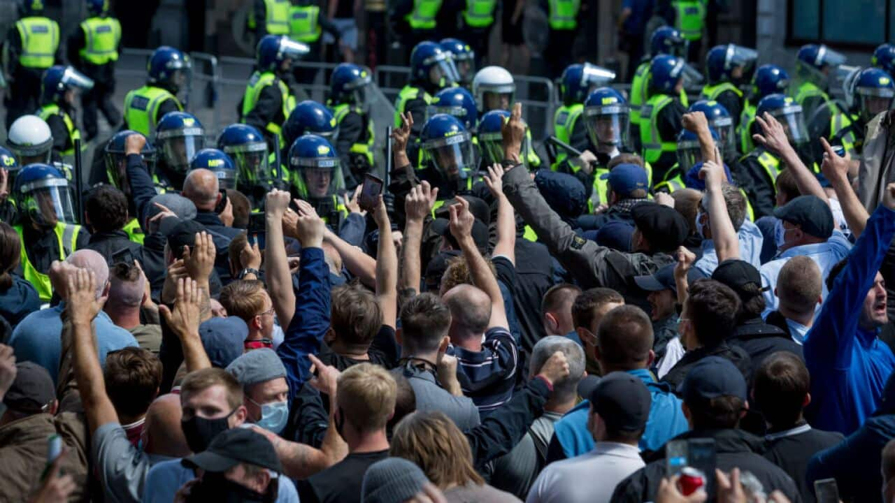 Far-right protesters gathered in central London to 'defend' a UK war memorial.