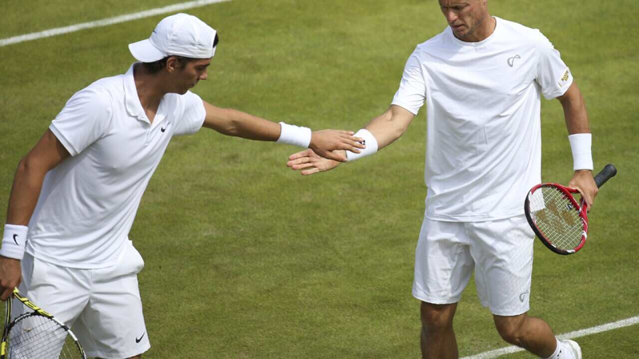 Lleyton Hewitt (right) and Thanasi Kokkinakis