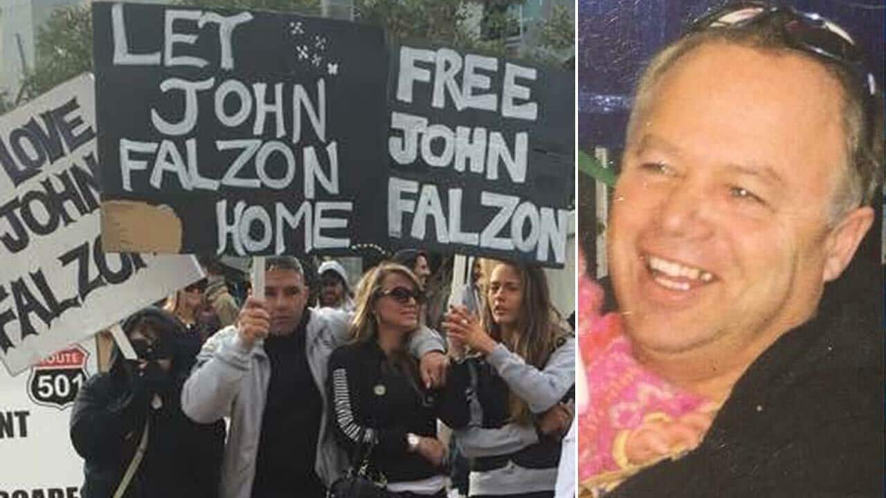 Supporters rally in Melbourne calling for John Falzon, right, to remain in Australia.