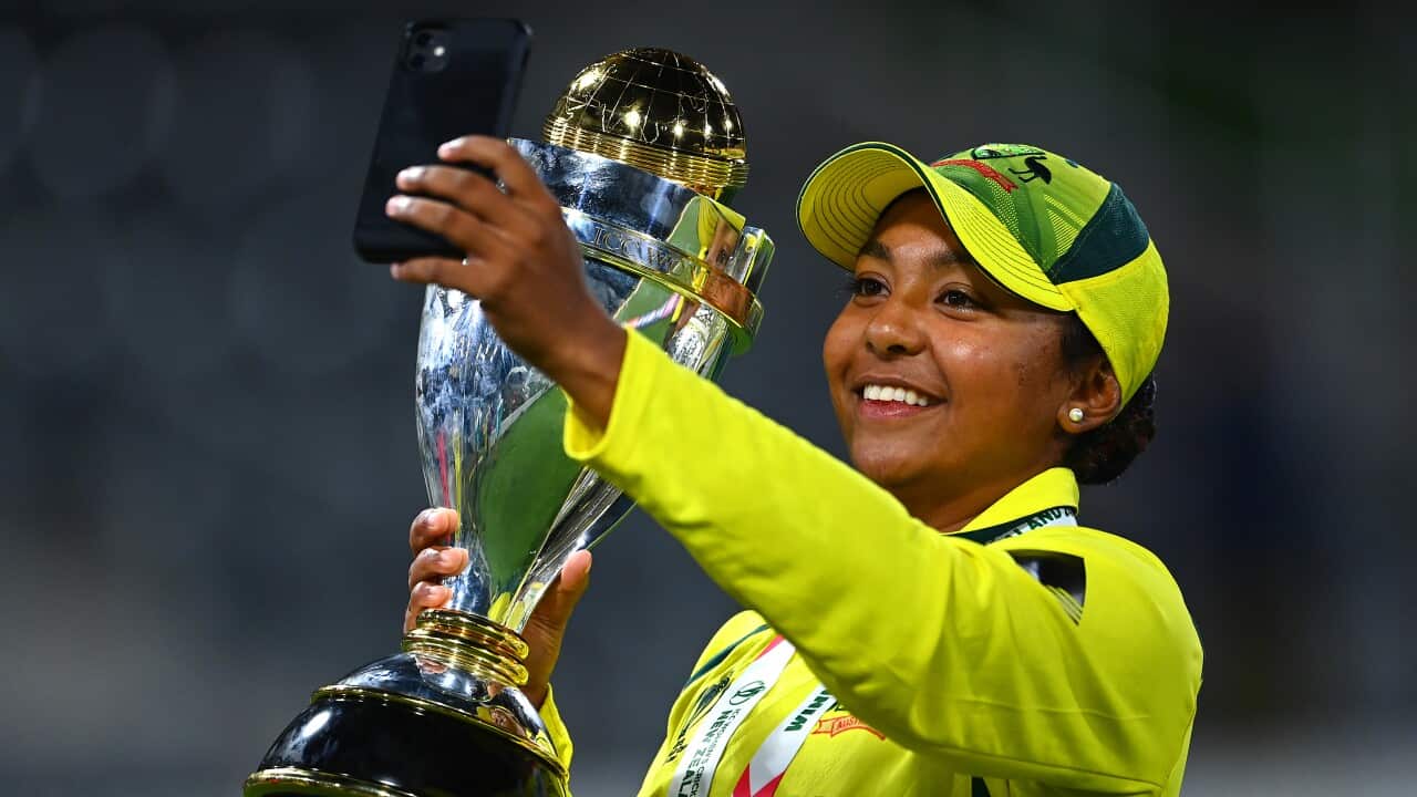 Alana King of Australia takes selfies with the trophy