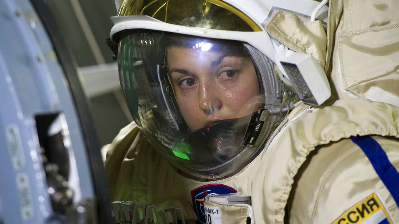 Russian cosmonaut Elena Serova takes part in a preflight training session with a hatch of the International Space Station at the Gagarin Cosmonauts' Training Centre in Star City centre outside Moscow, Dec 5, 2013. (STRINGER/AFP/Getty)