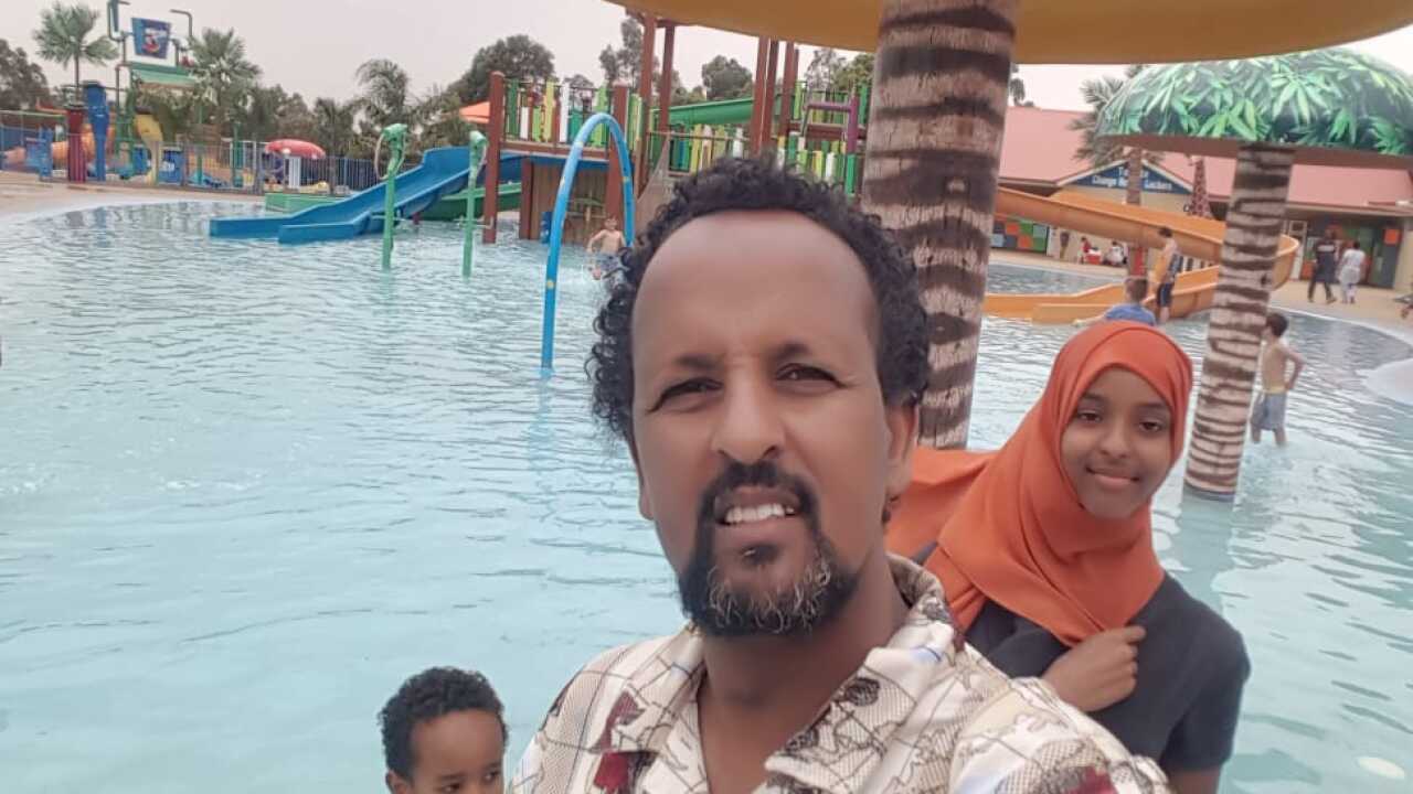 Hamdi Ali with his children