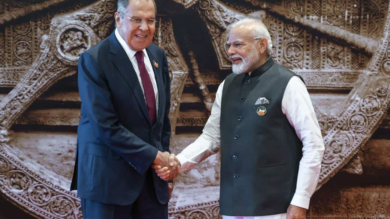 INDIA, NEW DELHI - SEPTEMBER 9, 2023: Russia's Minister of Foreign Affairs Sergei Lavrov and India's Prime Minister Narendra Modi shake hands at the 2023 G20 Summit.
