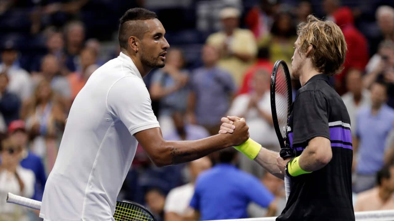 Nick Kyrgios, left, of Australia, shakes hands with Andrey Rublev, of Russia, after Rublev won their match during the third round of the U.S. Open tennis tournament Saturday, Aug. 31, 2019, in New York. (AP Photo/Adam Hunger)