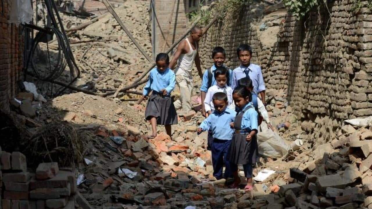 Children in Nepal return to school after the quake