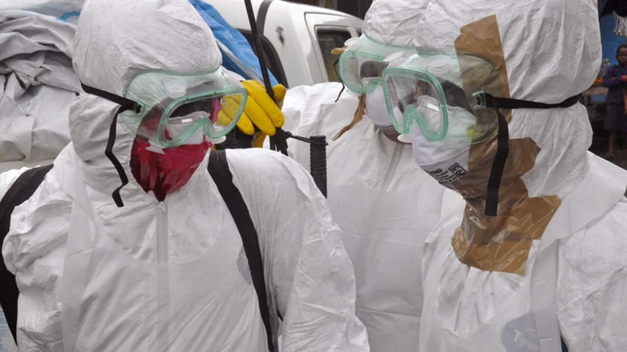 Heath workers in protective gear