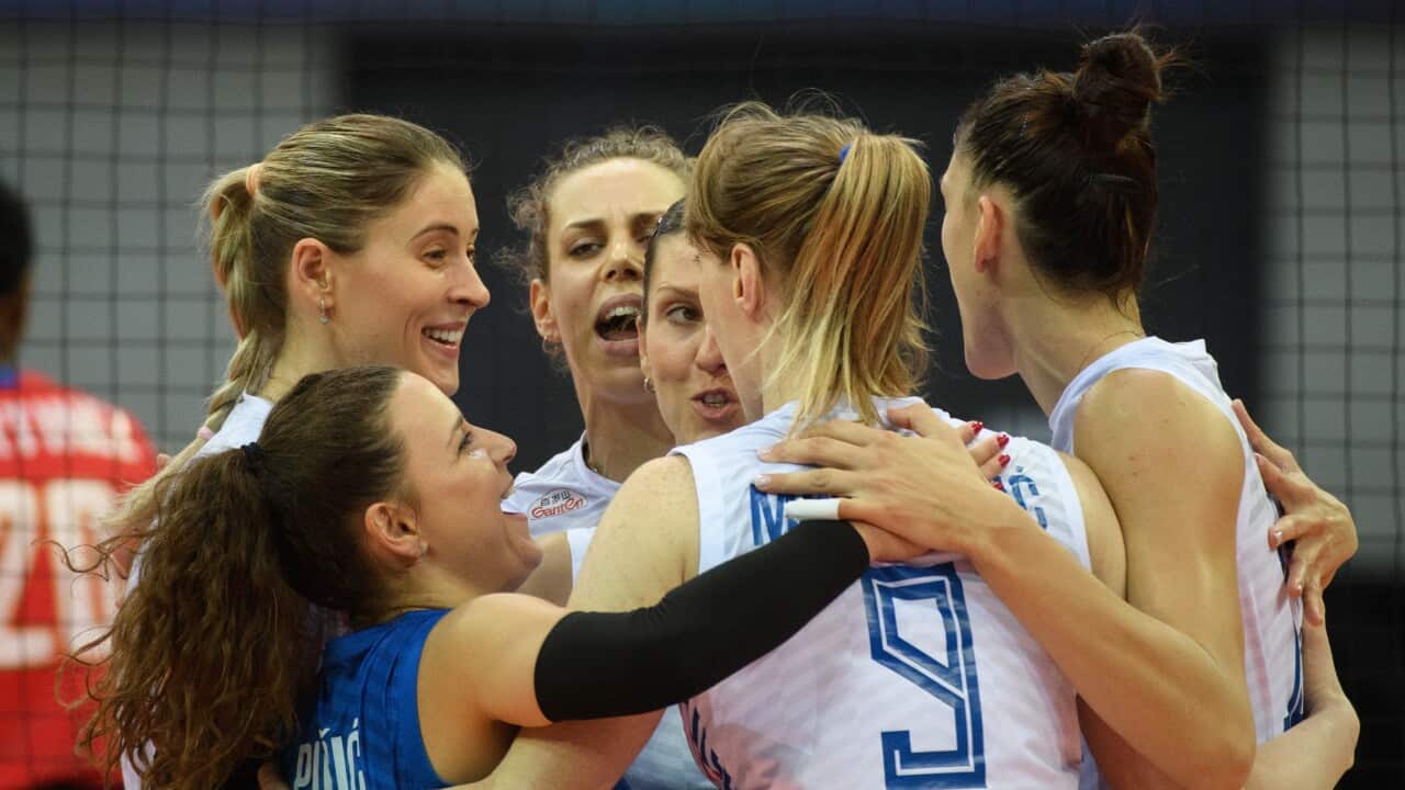 Serbian national team players celebrate a point during the 2022 Volleyball Women's World Championship vs Dominican Republic in Lodz, Poland