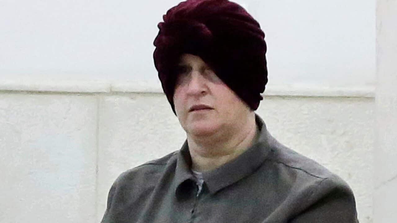 Israeli-born Australian Malka Leifer, right, is brought to a courtroom in Jerusalem in February 2018.