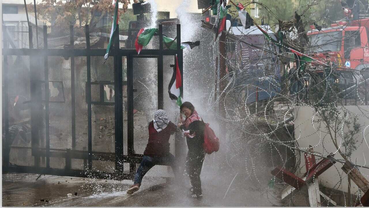 Protesters in Beirut are stopped from approaching the US embassy