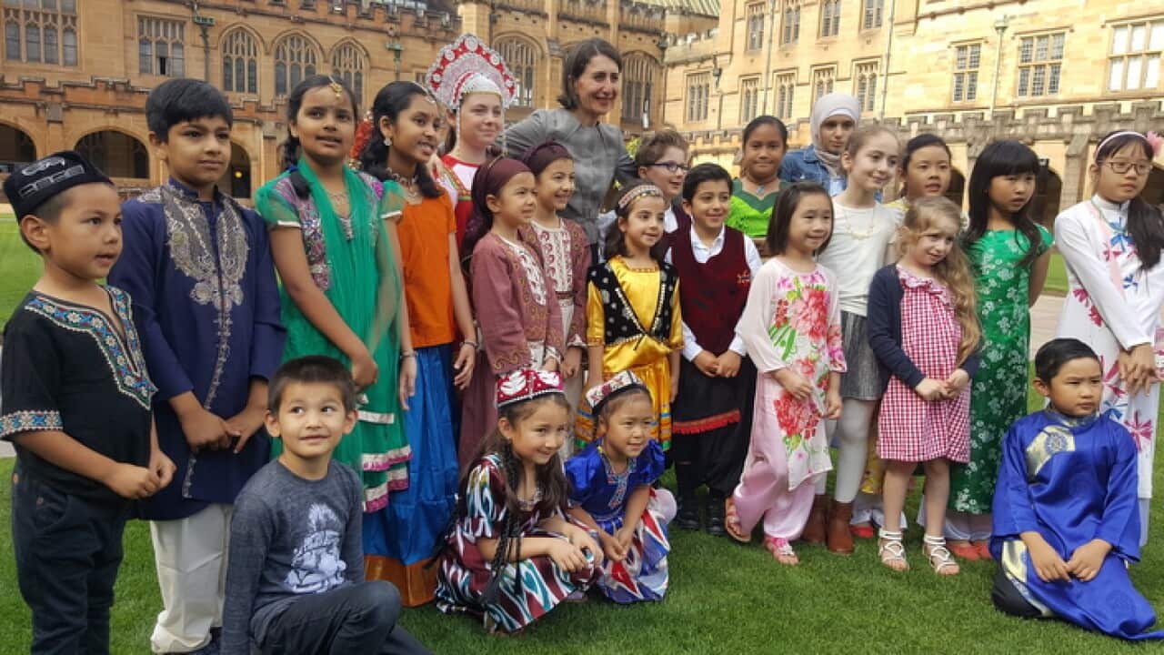 NSW Premier with school children launching the community language education program.