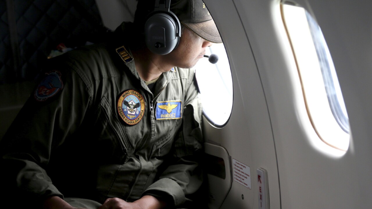 An Indonesian Navy CN-235 transport plane over Java Sea