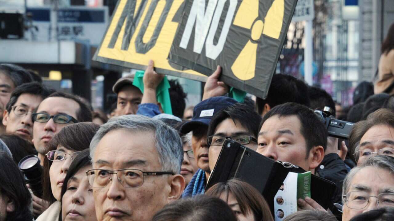 A crowd listening to a campaign speech in Tokyo