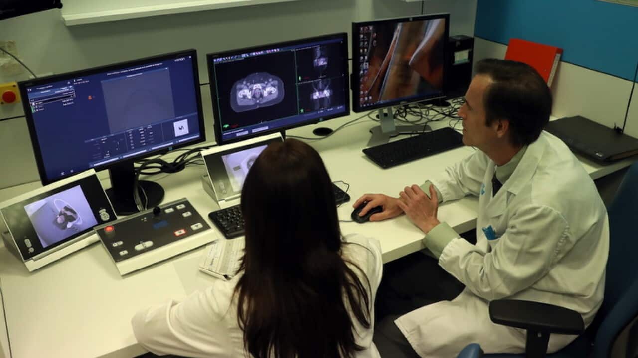 A patient receives treatment from a doctor