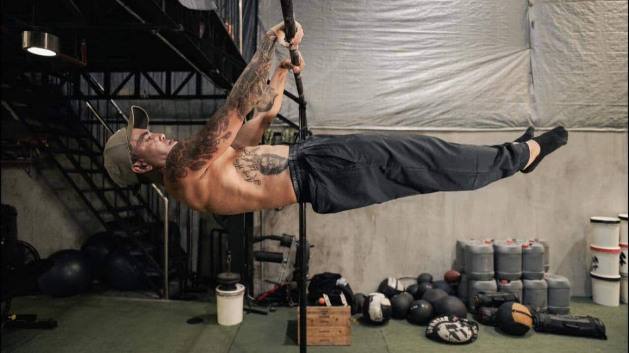 Sydneysider Bjorn Santos balances being a registered nurse, professional guitarist, and calisthenics coach.