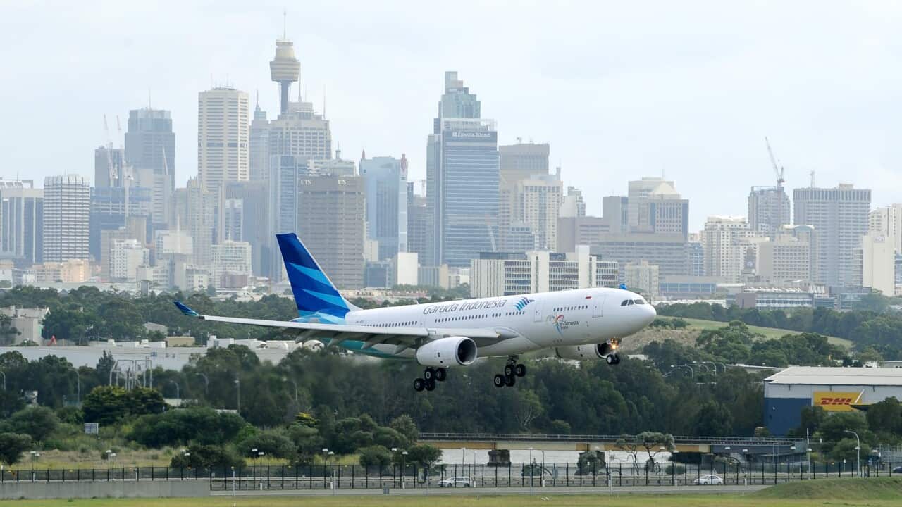 A Garuda Indonesia Airlines aircraft is pictured about to touch down at Sydney International Airport in Sydney on Wednesday, Dec. 30, 2009. (AAP Image/Dan Himbrechts) NO ARCHIVING