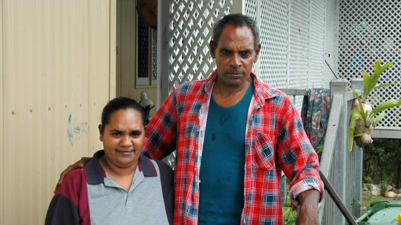 Palm Island elder David Bulsey (right) and Yvette Lenoy on Palm Island, north Queensland (AAP).