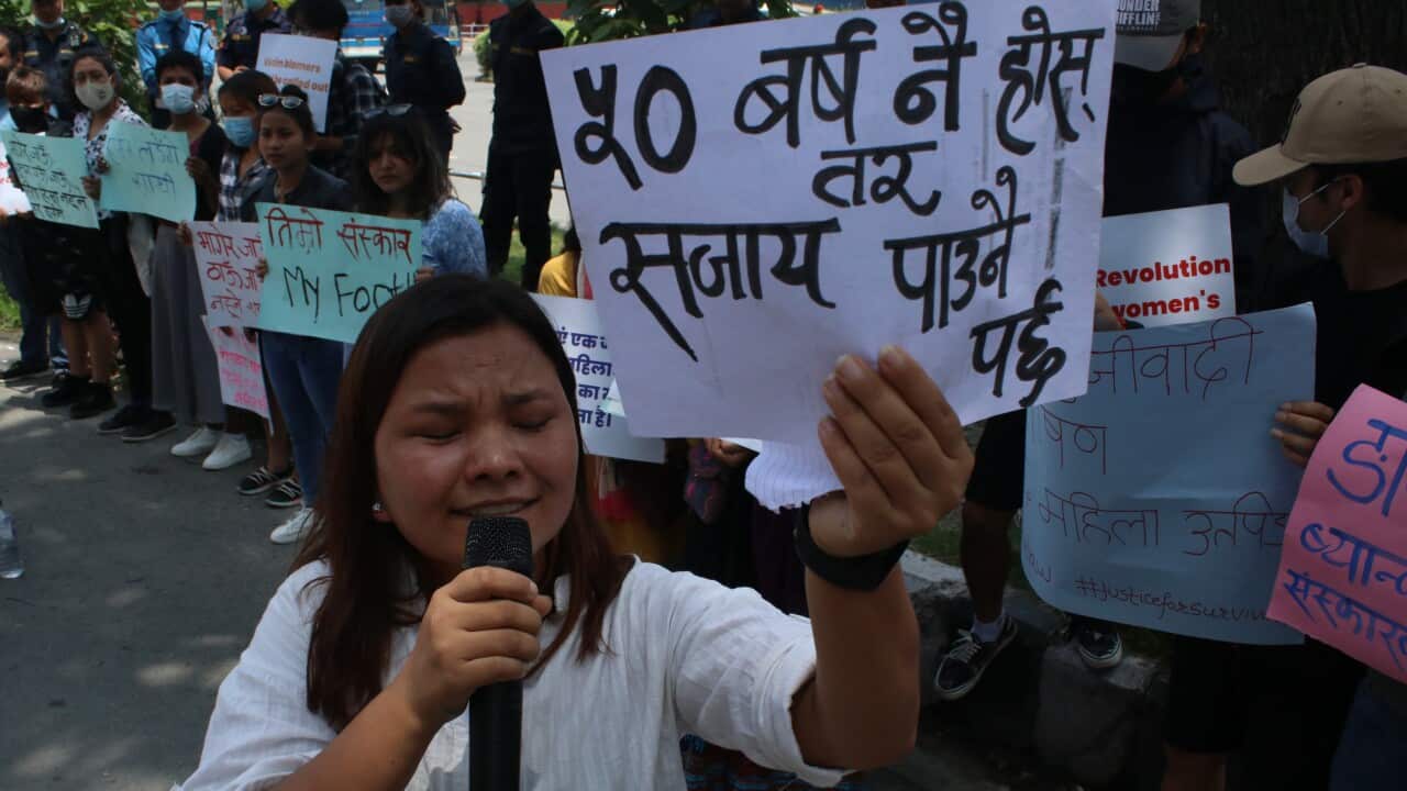 On June.18,2022 in Kathmandu, Nepal. Youth activict from Aajad Morcha hold play cards and chant slogans during street drama against all form of oppression on women (Photo by Abhishek Maharjan/Sipa USA)