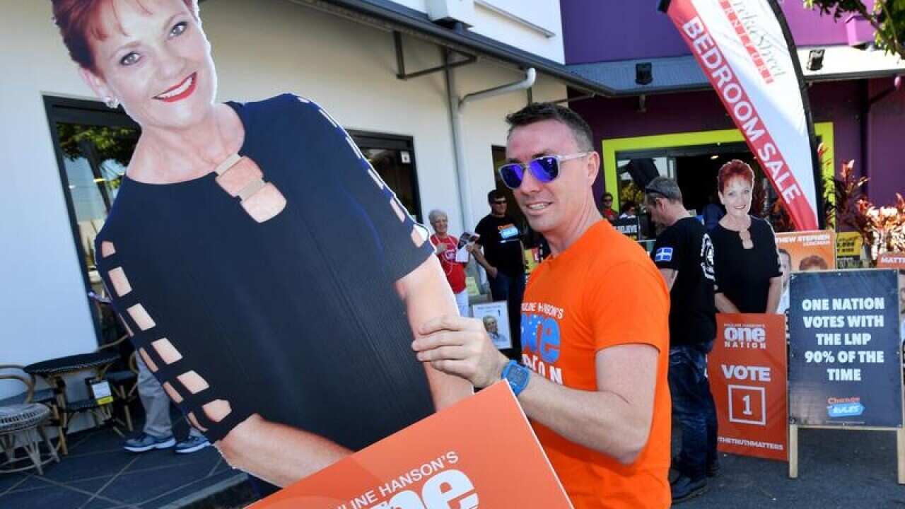 One Nation's James Ashby with a cardboard cutout of Pauline Hanson.