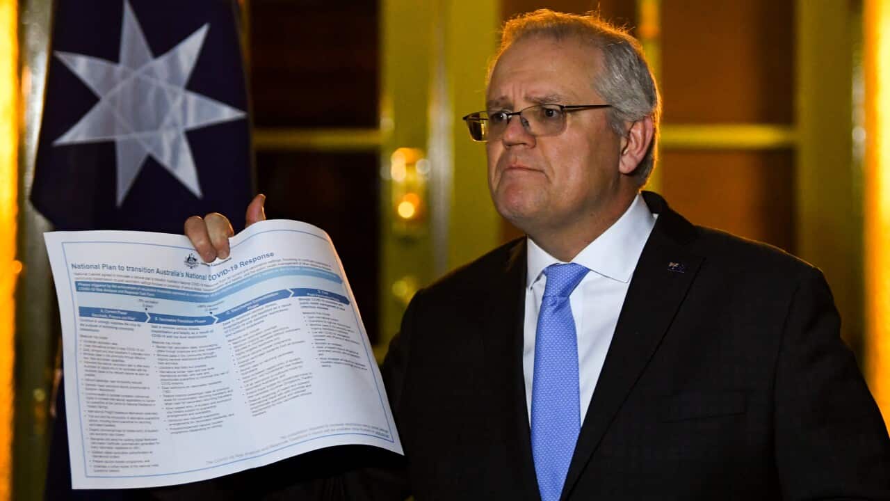 Australian Prime Minister Scott Morrison speaks to the media during a press conference following a national cabinet meeting, at the Lodge in Canberra, Friday, July 30, 2021.