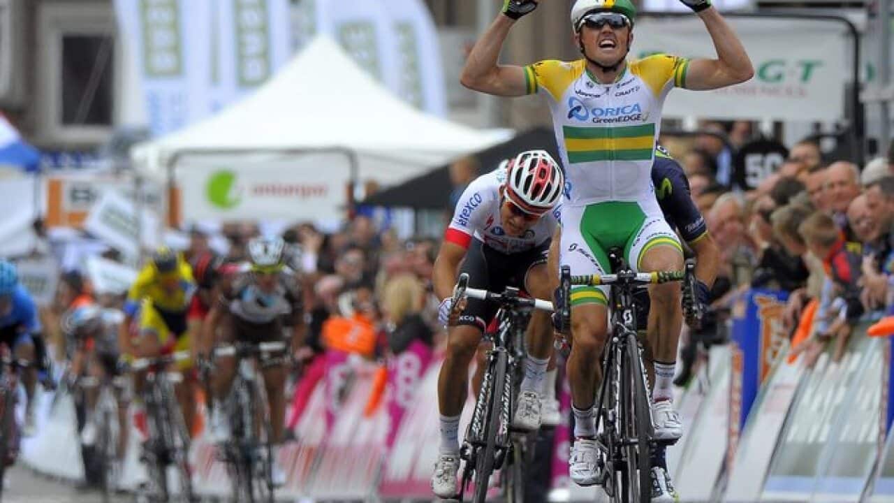 epa04182675 Orica Greenedge team rider Australian Simon Gerrans celebrates after winning the Liege Bastogne Liege cycling race from Liege to Ans, Belgium,  27 April 2014.  EPA/NICOLAS BOUVY
