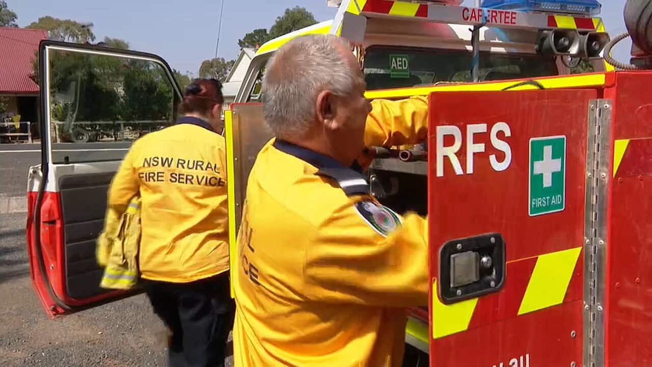 Members of the Capertee RFS prepare to go to work